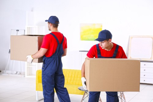 Professional removals team planning a house move in Harlington