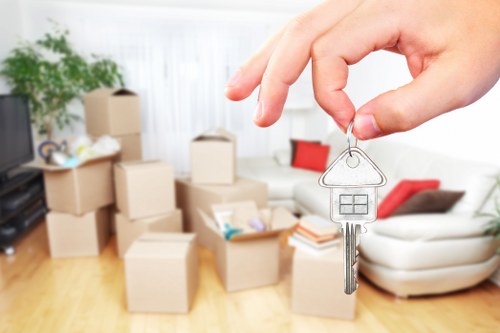 Packed boxes and furniture prepared for extended storage in Harlington