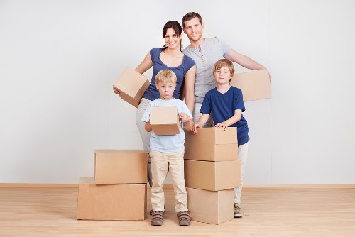 Packed boxes and furniture prepared for removals in Harlington