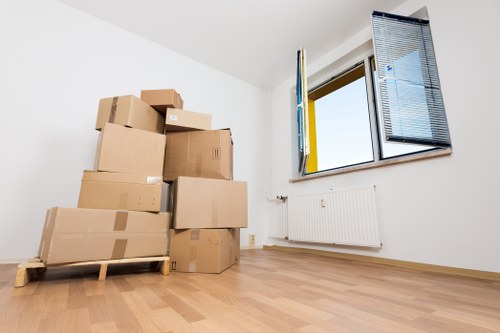 Packed boxes and furniture in household storage in Harlington
