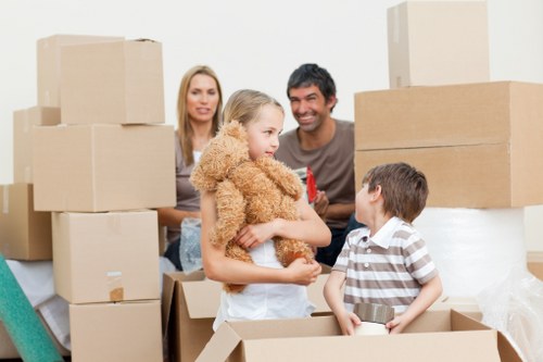 Careful packing of office documents and equipment for a Harlington move
